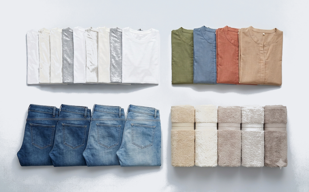 One balanced ~8 kg load laid out flat: T-shirts, jeans, kurtis and towels